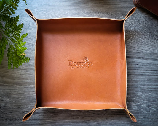 Catchall EDC tray made from tan Wickett & Craig leather empty sitting on a desk